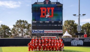 Boston University softball team jumps up in celebration after hearing their name called during the NCAA selection show on ESPN2