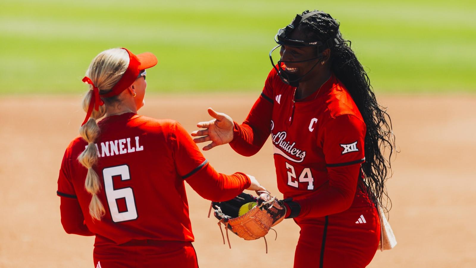 Kaitlyn Terry, Taylor Pannell and Jackie Lis celebrating at home plate after a home run
