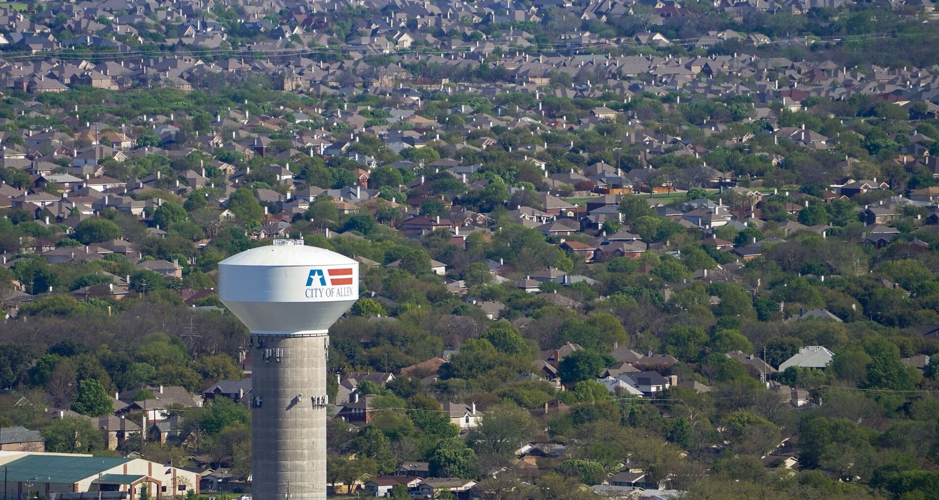 Aerial view of water tower and residential neighborhood in Allen, Texas on Tuesday, March 24, 2020.