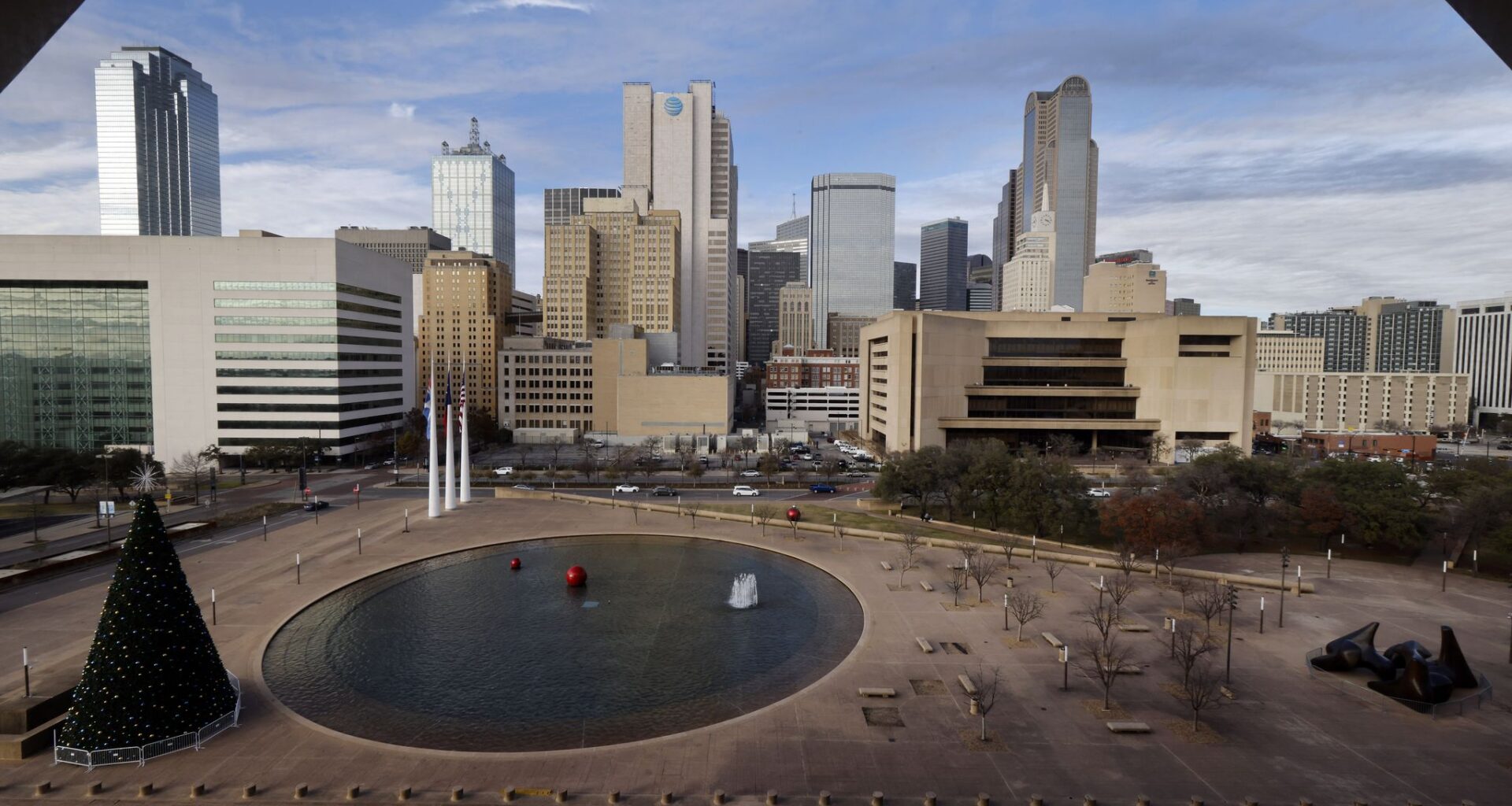 Attorneys threaten suit if City Hall Plaza is redeveloped without OK.