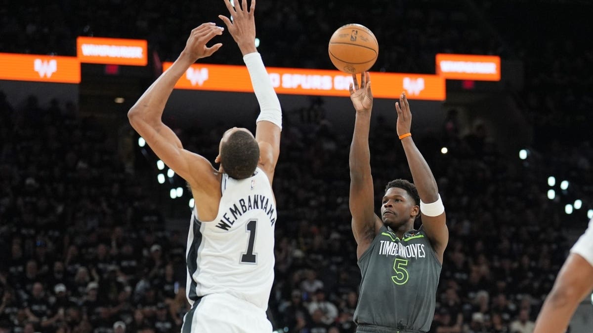Minnesota Timberwolves All-Star Anthony Edwards shoots over San Antonio Spurs C Victor Wembanyama during Game 2 of the 2026 Western Conference Semifinals.