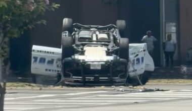 Dallas police officer, driver hospitalized after patrol car flips in crash