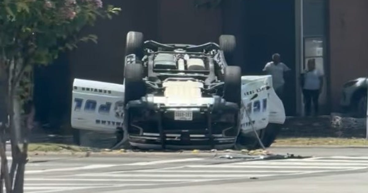 Dallas police officer, driver hospitalized after patrol car flips in crash