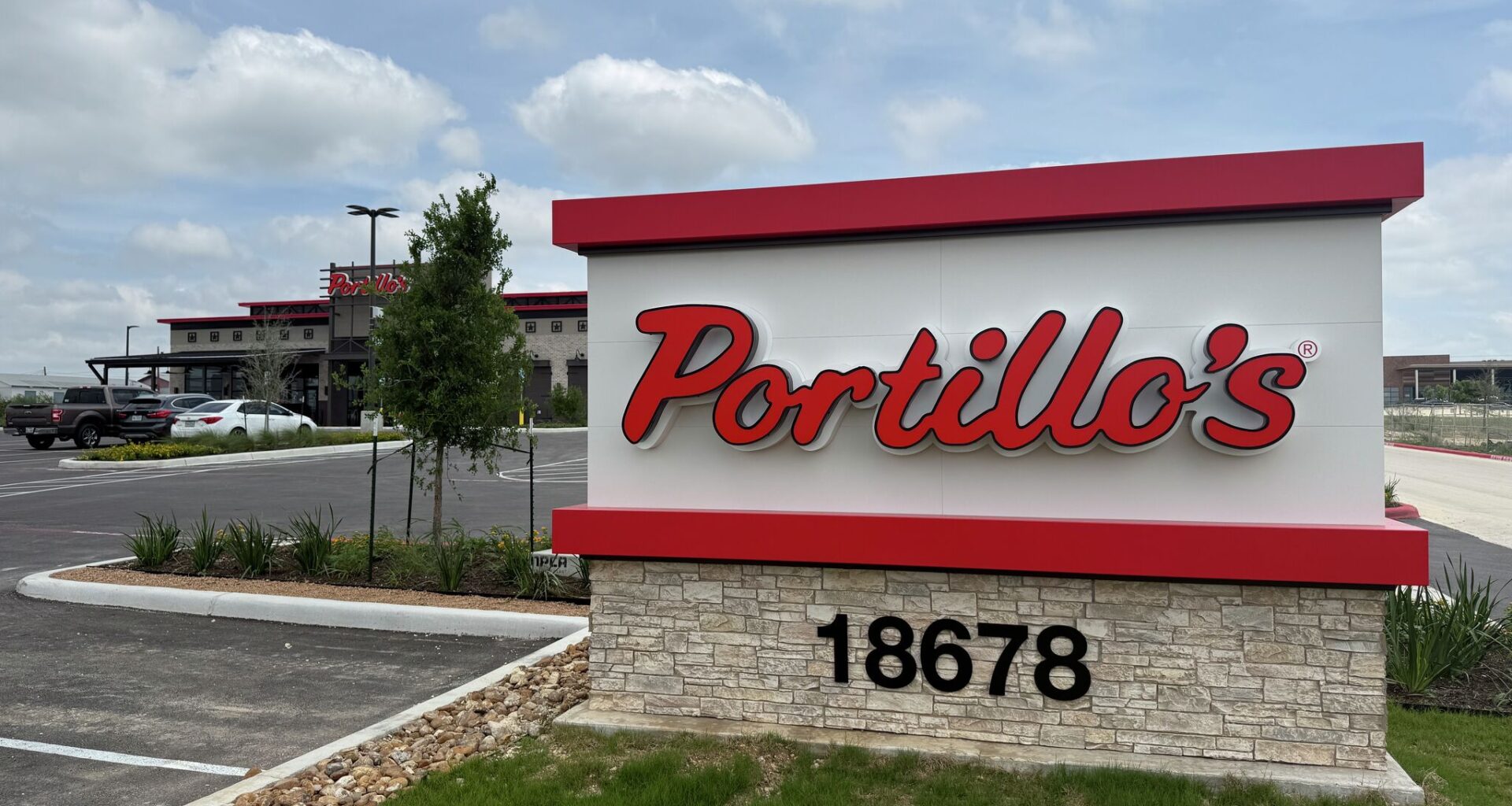 New exterior signage is visible at Portillo’s in Schertz on May 5, 2026, as construction moves into its final stages.
