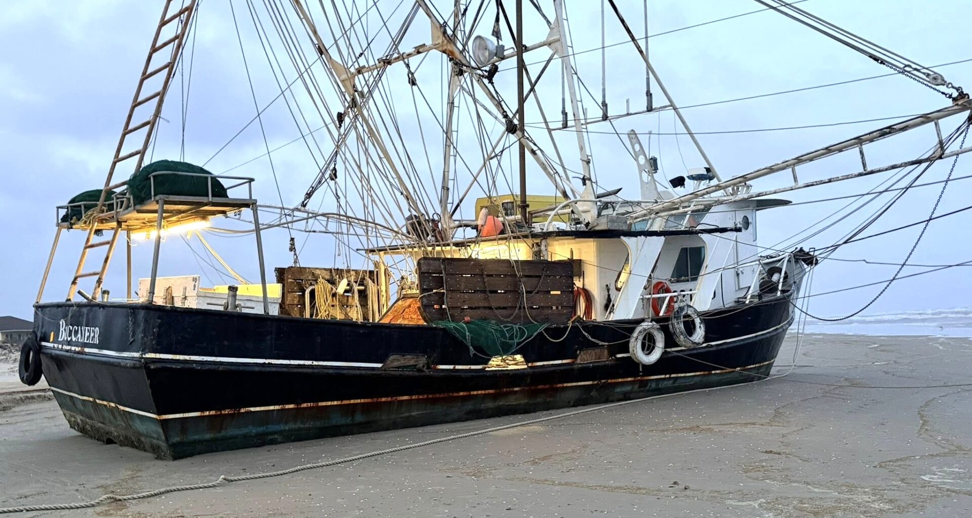 A Texas beach now has an unexpected attraction: A stranded shrimp boat