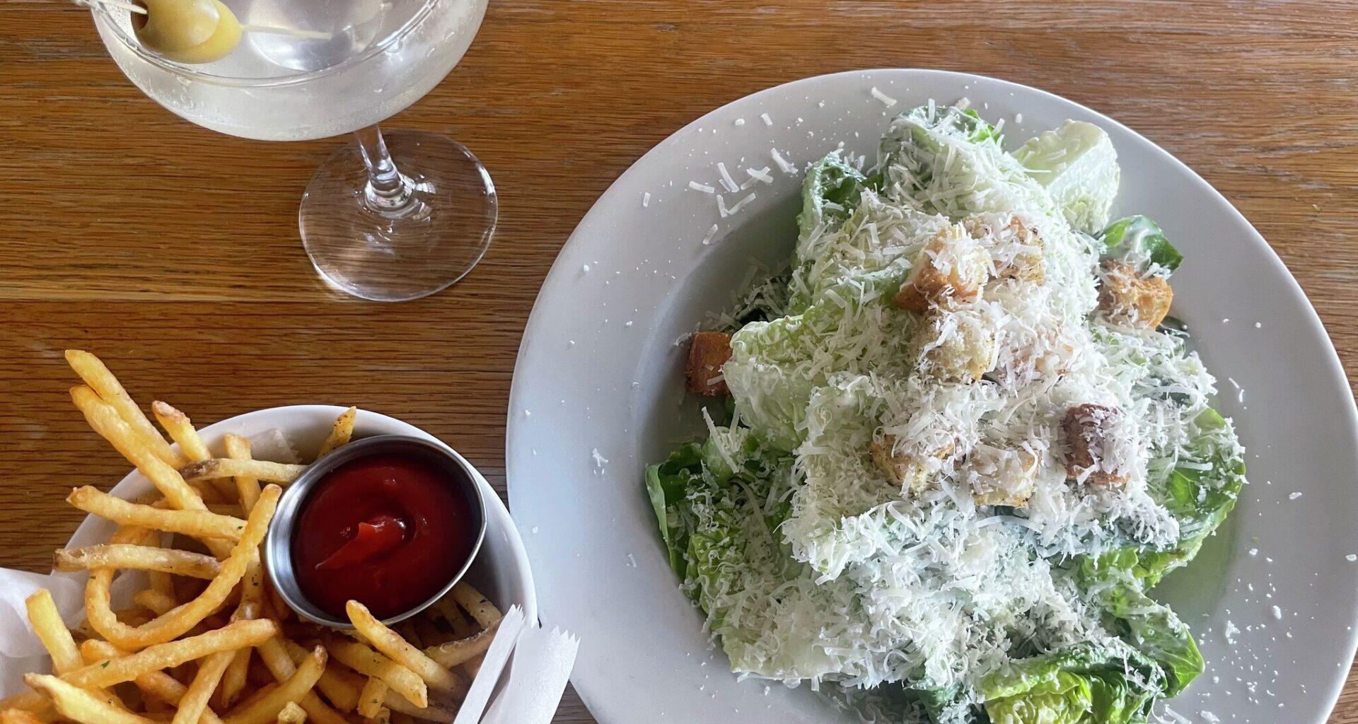 Hank's, located in East Austin, offers $20 "girl dinner" deals every Thursday where patrons can opt for a Caesar salad or wrap, french fries or sweet potato fries and their martini of choice.