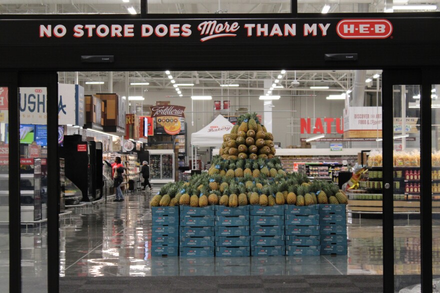 A glimpse inside shows employees prepping the store for opening day. May 19, 2026.