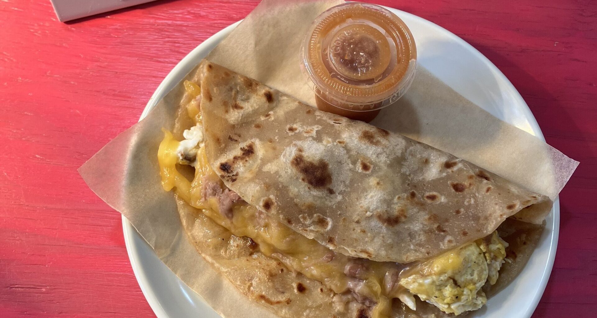 A bean, cheese and egg taco at Comadre Panadería in East Austin, Texas. 