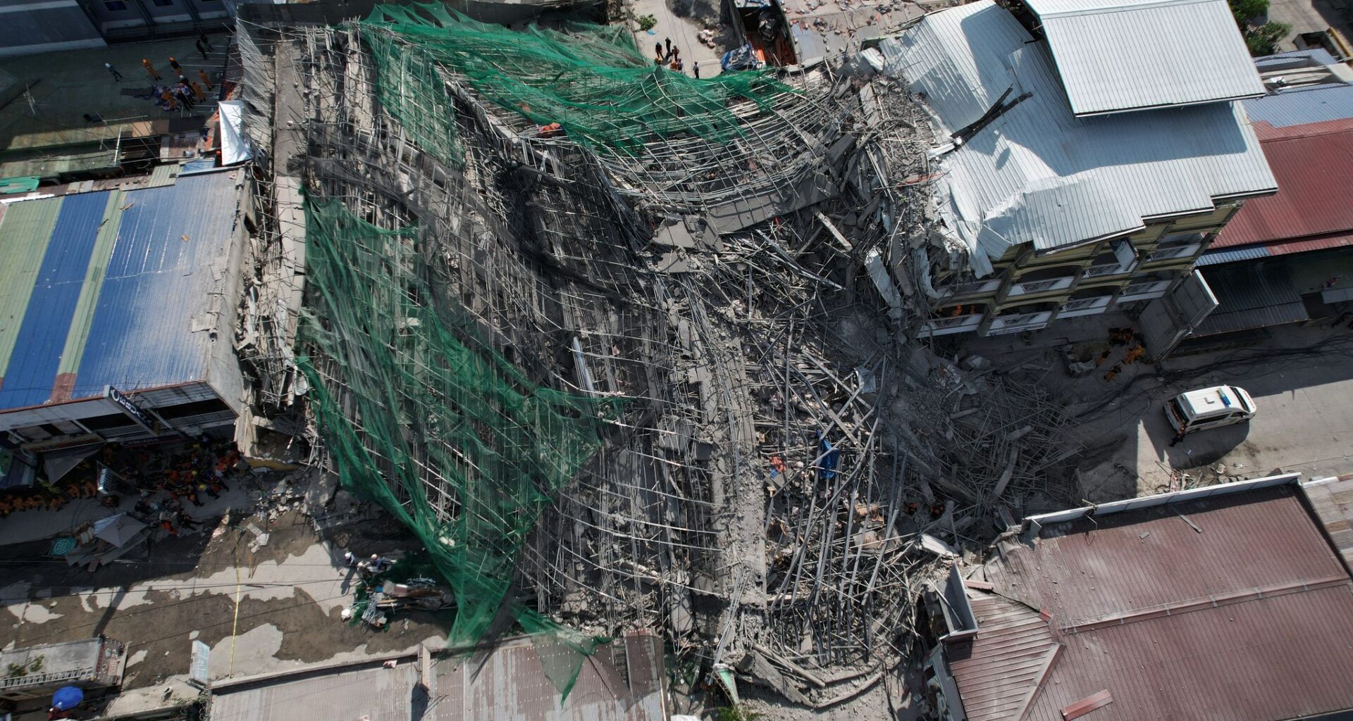 Building under construction in Philippines collapses, leaving 1 dead and 21 trapped