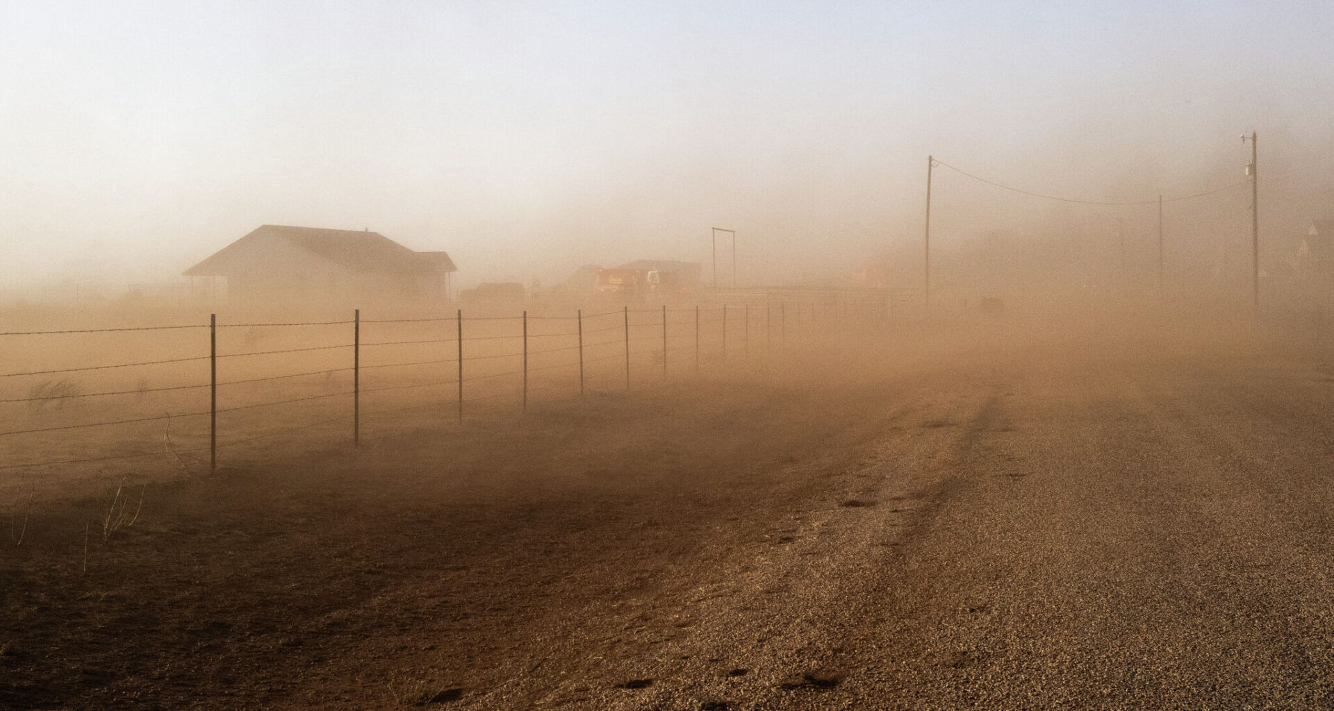 Dust walls and landsprouts invade tiny Texas towns