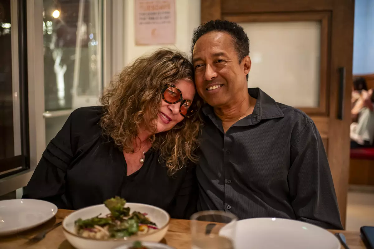 Robin Wiley (left) and Armand Daniels heard about the pay-what-you-will promotion on social media.
