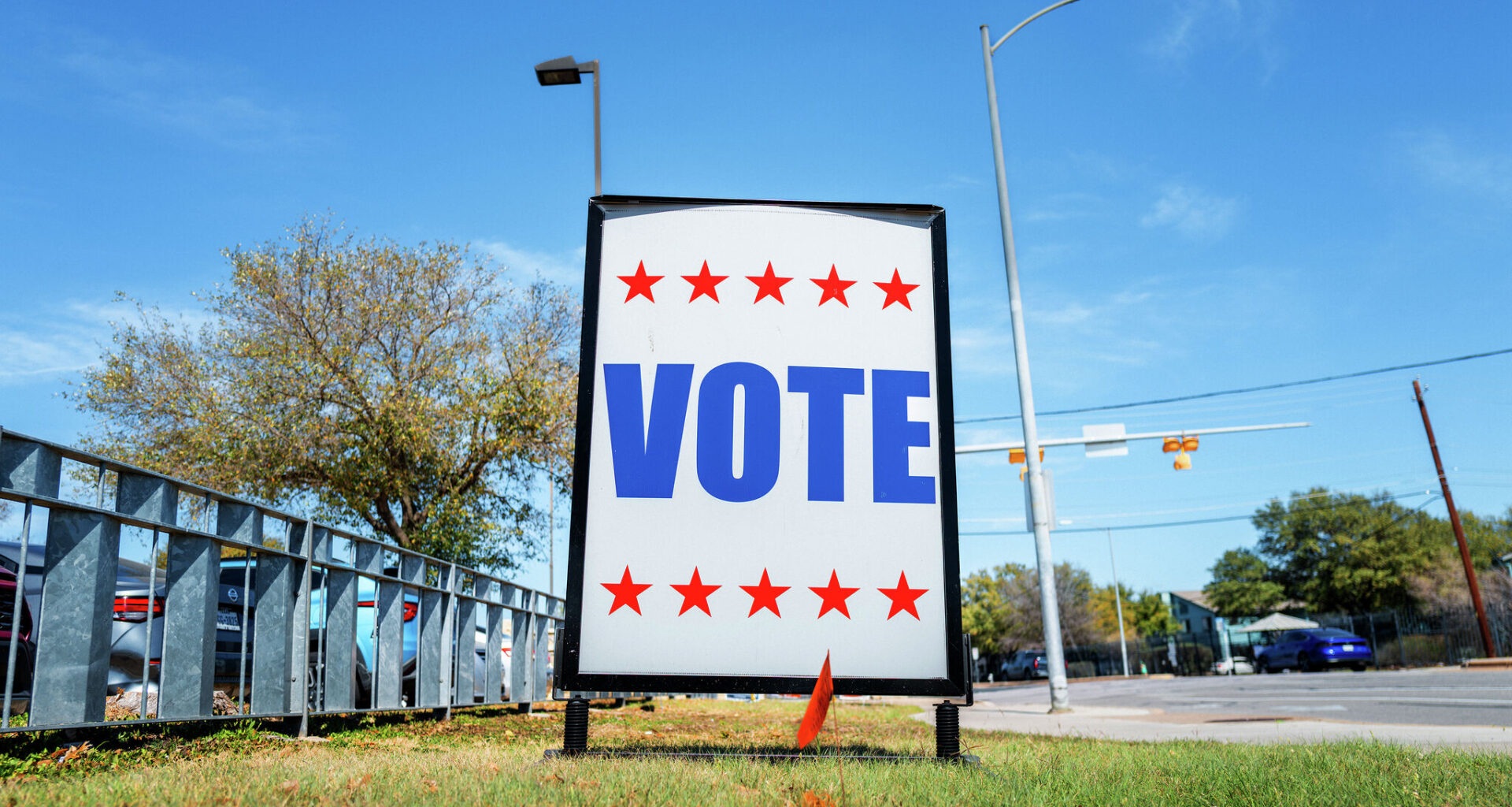 A "VOTE" sign is posted near a polling center in Austin. Texans head to the polls Tuesday to decide races for the Senate and other statewide and local offices. 