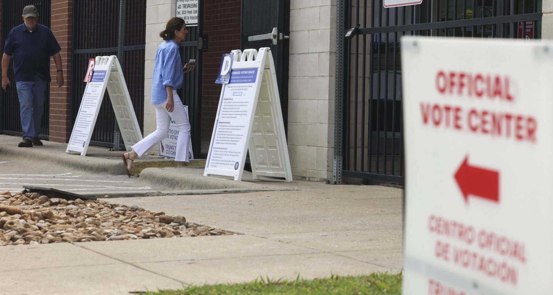 Voters enter a voting center during primary election runoff day at Oak Lawn Library on Tuesday, May 26, 2026 in Dallas.