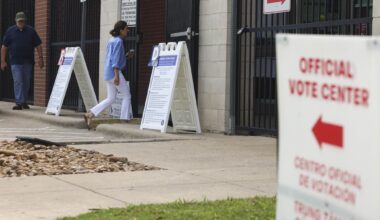 Voters enter a voting center during primary election runoff day at Oak Lawn Library on Tuesday, May 26, 2026 in Dallas.