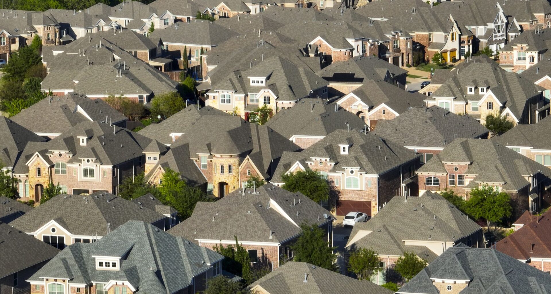 Aerial view of homes in the Harrington Mills subdivision on Saturday, April 8, 2023, in Plano.