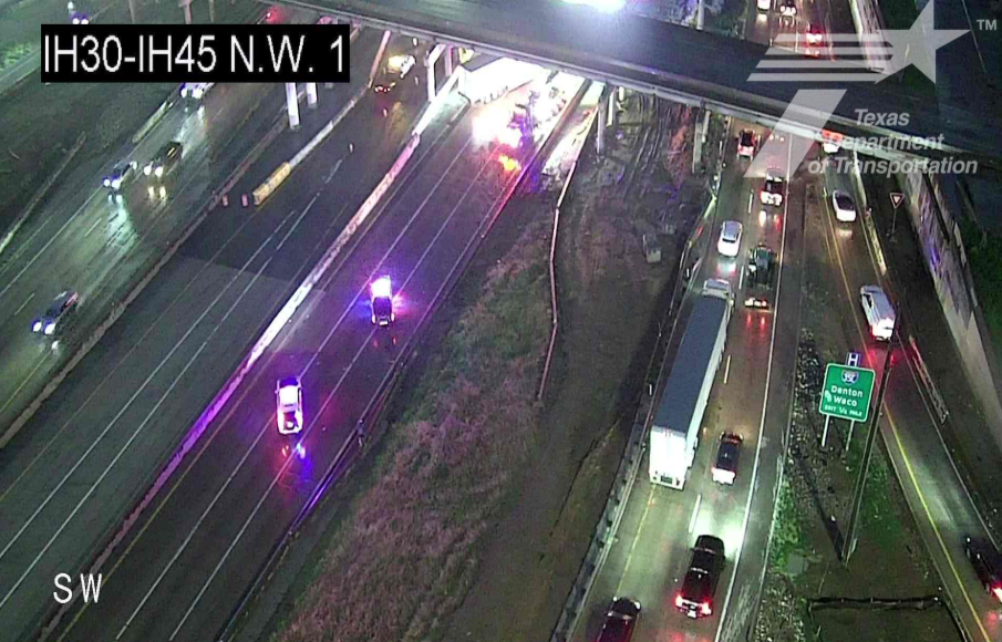 All westbound Interstate 30 lanes remain closed after an 18-wheeler overturned at Good Latimer Expressway early Wednesday morning. 