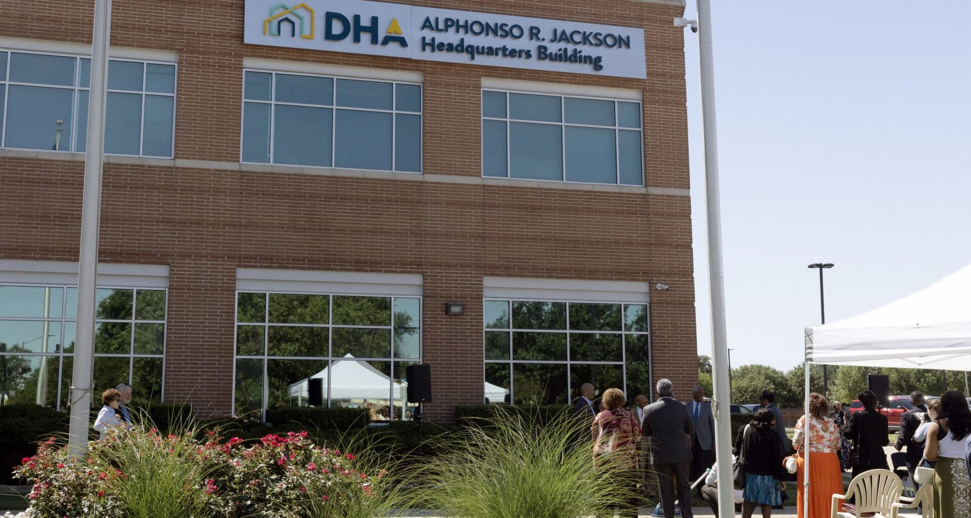 The Dallas Housing Authority’s Alphonso Jackson Headquarters Building sign is seen after its unveiling, Thursday, June 6, 2024, in Dallas.