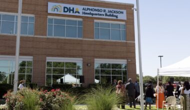 The Dallas Housing Authority’s Alphonso Jackson Headquarters Building sign is seen after its unveiling, Thursday, June 6, 2024, in Dallas.