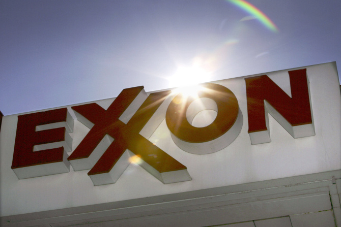 This Oct. 26, 2006, file photo, shows an Exxon logo seen at a Dallas gas station. (AP Photo/LM Otero, File)