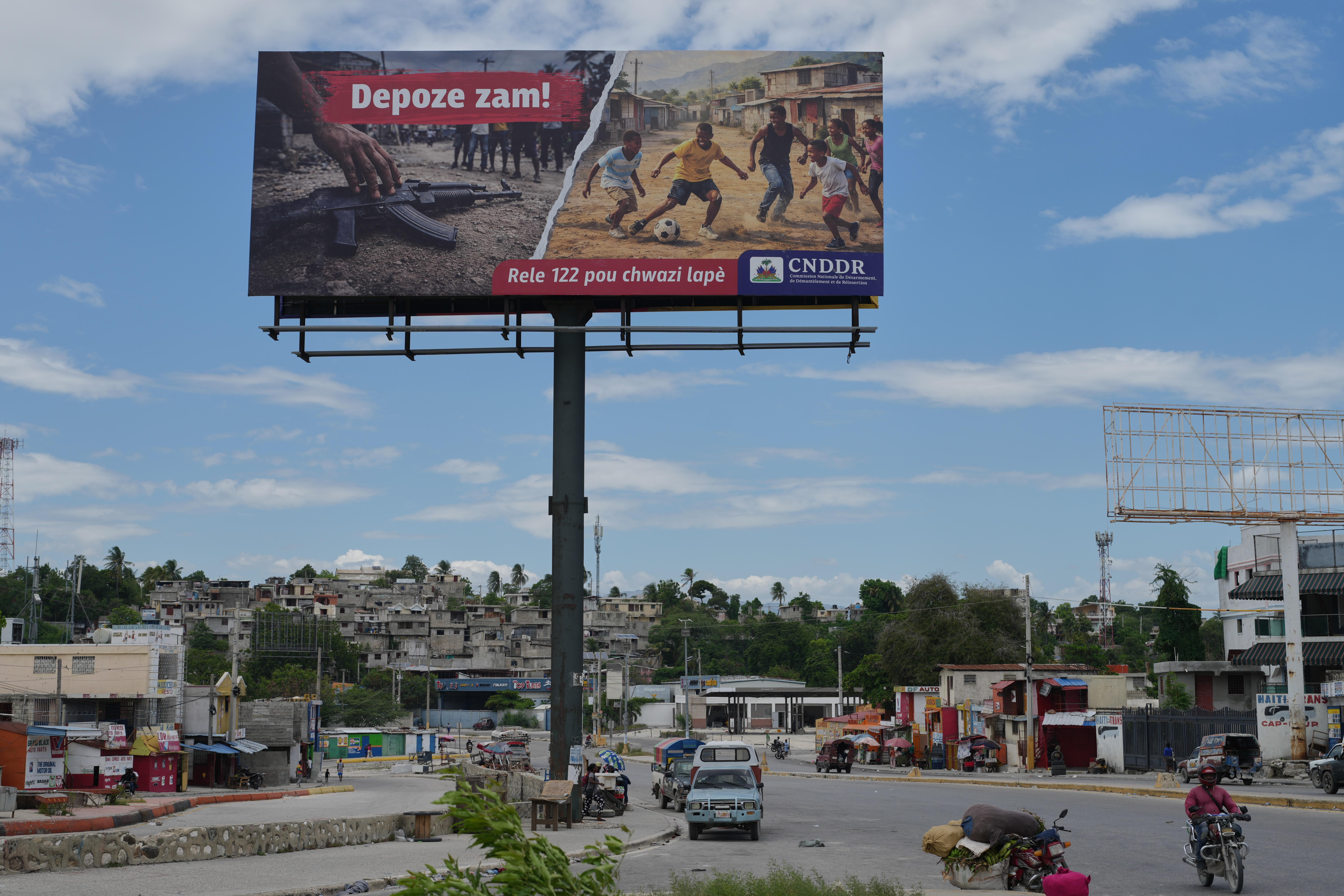 A billboard installed as part of a government disarmament campaign...