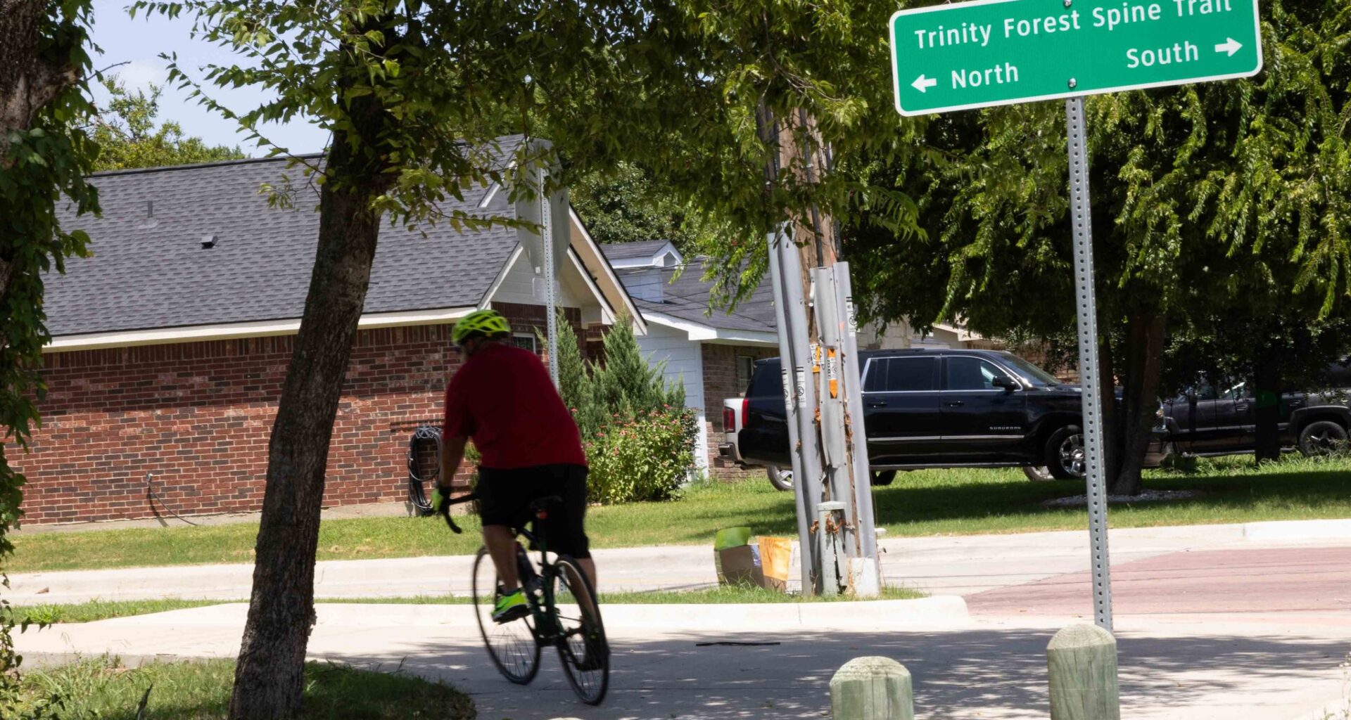 Council member Jaime Resendez rides his bike on the Trinity Forest Spine Trail in Dallas on Friday, July 18, 2025.