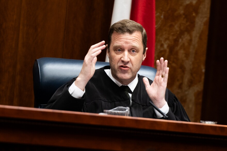 Justice Evan A. Young questions Amanda G. Taylor, Butler Snow LLP, during the oral argument for Texas Department of State Health Services, and Dr. Jennifer A. Shuford v. Sky Marketing Corp., D/B/A Hometown Hero; Create a Cig Temple, LLC; Darrell Surif; and David Walden, at the Texas Supreme Court building on Wednesday, January 14, 2026.