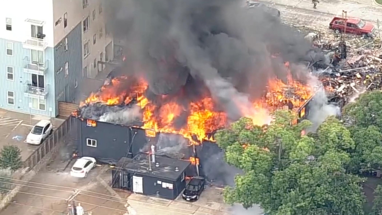 A large fire has erupted at an apartment complex in Dallas