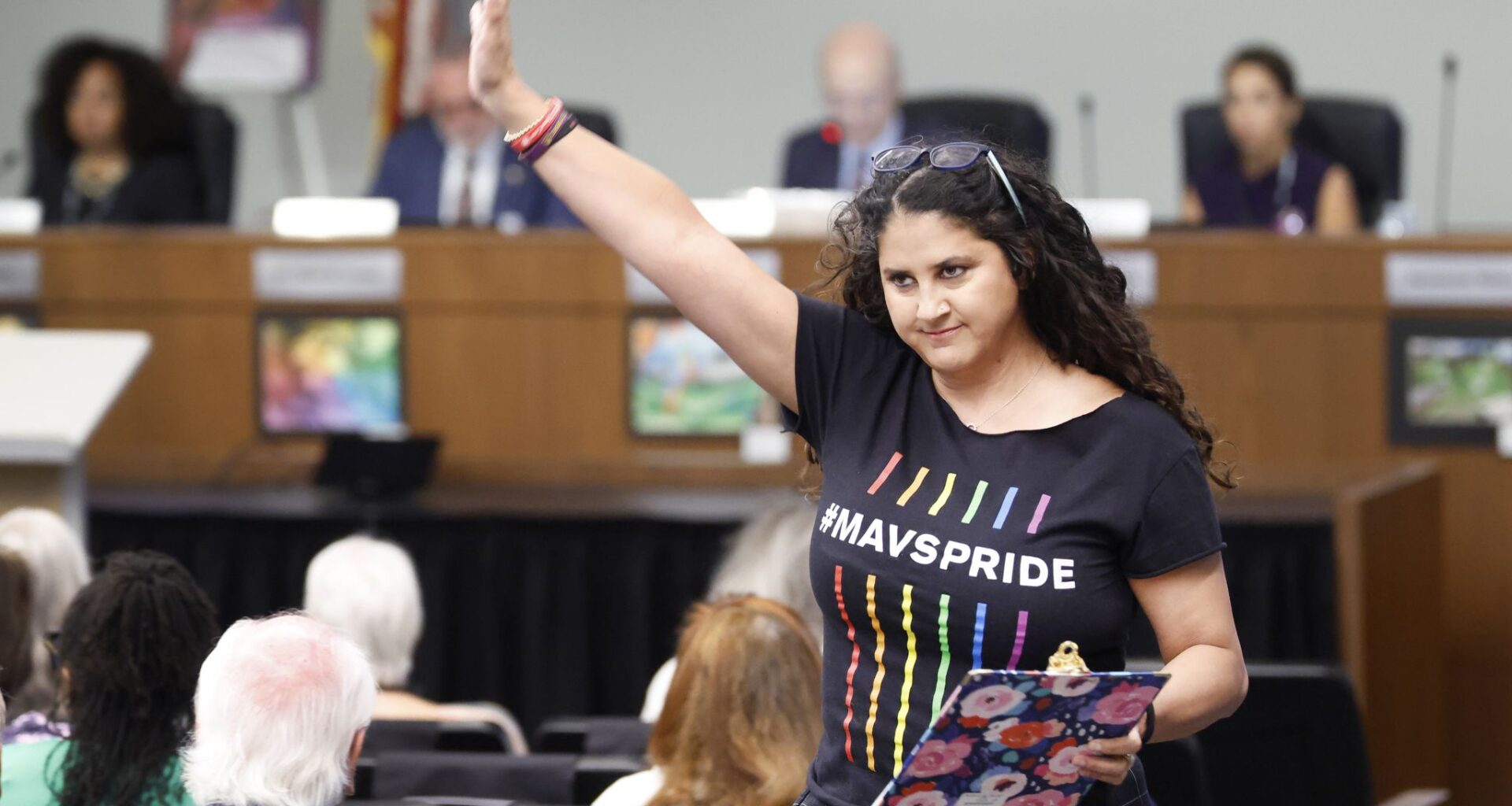 Sabrina Ball, a parent in Fort Worth ISD, is among those demanding the district reinstate Shayma Alzubi as principal of Western Hills High School. Pictured, Ball acknowledges support after speaking before the newly appointed Fort Worth Independent School District Board and Superintendent Peter Licata at the District Service Center in Fort Worth, Texas, March 31, 2026.