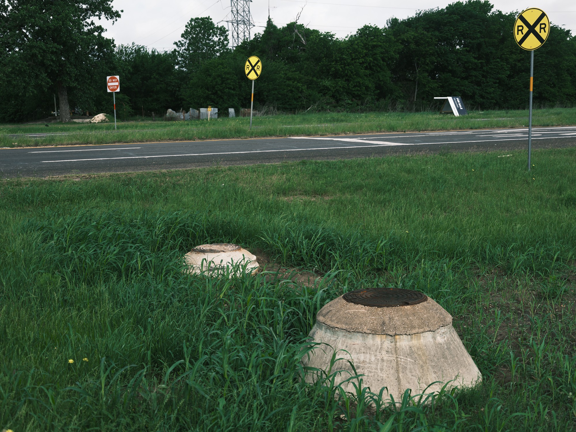 Cars often crash into raised manhole covers along Route 77 in Lacy Lakeview. The city would replace or relocate the manholes with additional tax revenue from the proposed Infrakey data center.