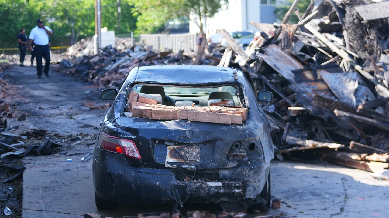 Crews scour the site of a deadly Dallas apartment blast and fire searching for more possible victims