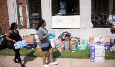 People drop off water bottles at Mission Oak Cliff in Dallas, Friday, May 29, 2026. Officials said at least three people died and several were injured after an explosion at an apartment building in north Oak Cliff on Thursday.