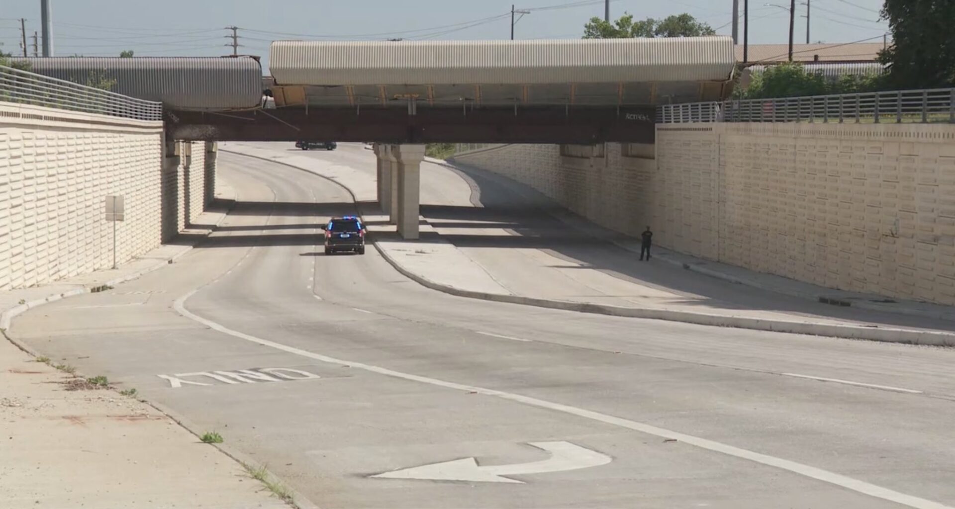 11 train cars derail from overpass in NW Houston causing traffic