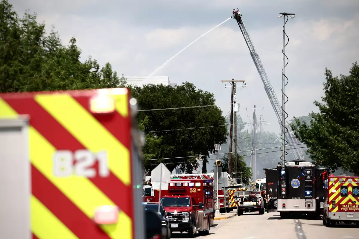 Dallas Fire and Rescue crews respond to an explosion and fire at an apartment complex in Oak Cliff Thursday afternoon.