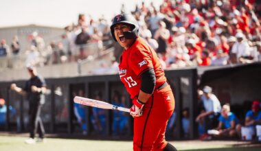 Taylor Pannell slides in safely to score a run against Tennessee at the WCWS.
