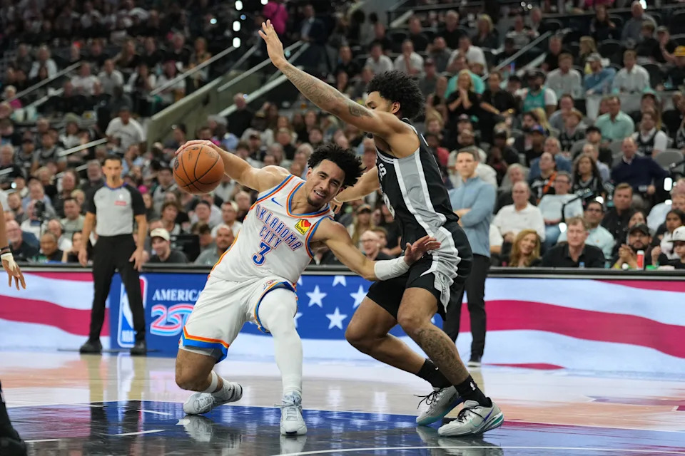 May 28, 2026; San Antonio, Texas, USA; Oklahoma City Thunder guard Jared McCain (3) dribbles the ball against San Antonio Spurs guard Dylan Harper (2) in the second half during game six of the western conference finals for the 2026 NBA playoffs at Frost Bank Center. Mandatory Credit: Daniel Dunn-Imagn Images