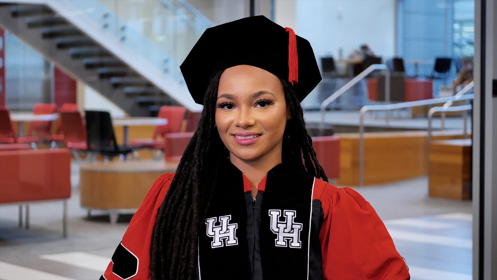 At 23, she is the youngest PhD graduate at UH