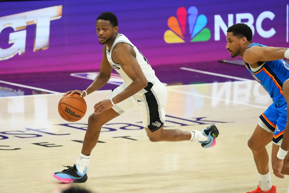 May 24, 2026; San Antonio, Texas, USA; San Antonio Spurs guard De'Aaron Fox (4) moves the ball in the fourth quarter against the Oklahoma City Thunder during game four of the western conference finals for the 2026 NBA playoffs at Frost Bank Center. Mandatory Credit: Scott Wachter-Imagn Images