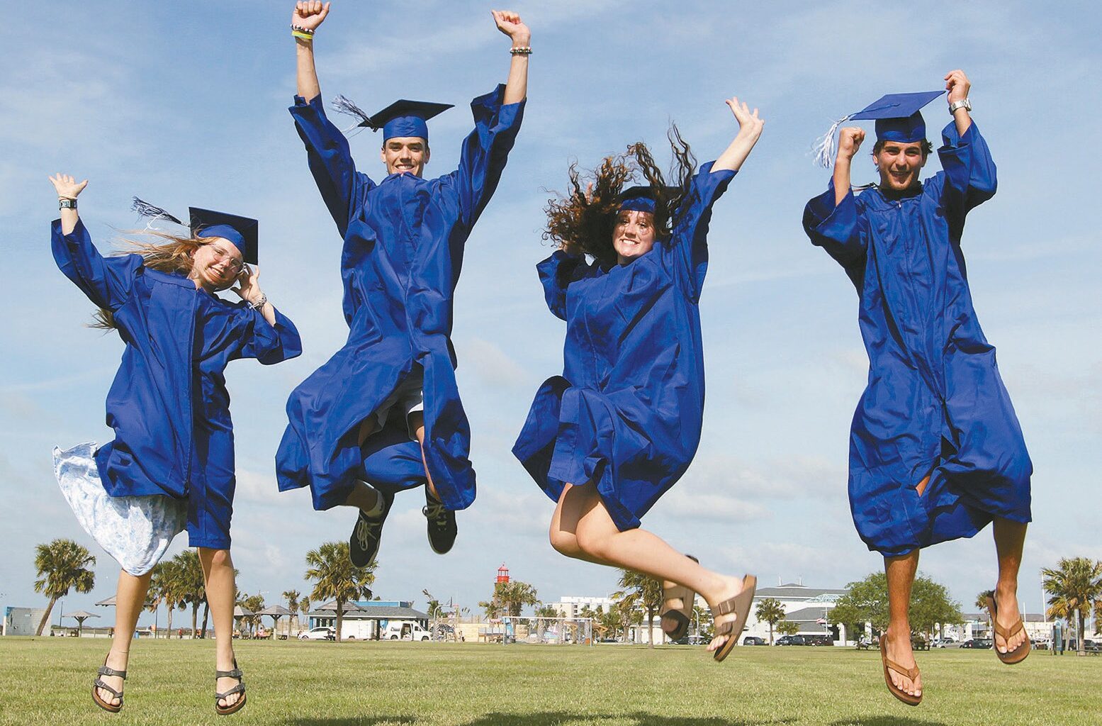 Jumping for joy are, from left, Port Aransas High School seniors Caitlyn Boyer, Tyler Hofhiens, Brooke Jones and Cohen Guevara. They are among 51 seniors who will take part in graduation ceremonies on Thursday, May 21. Staff photo by Dan Parker
