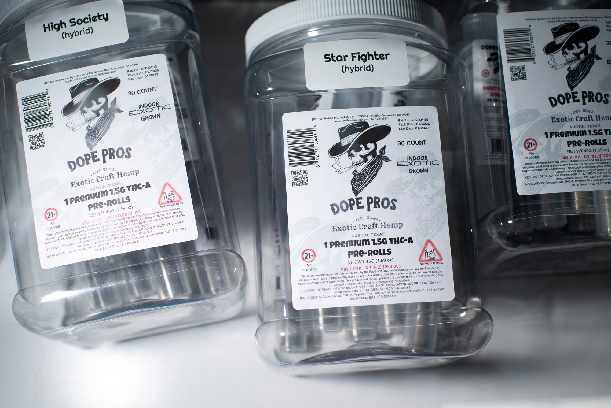 Individual packages of pre rolls in a display case at an Austin smoke shop on May 13, 2026.