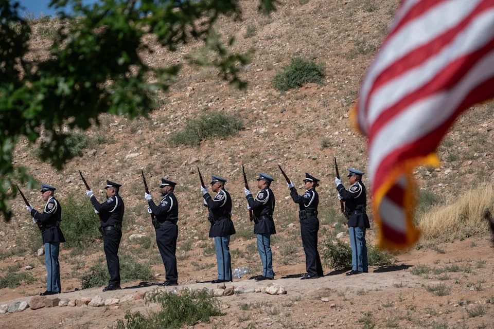 Officers perform a 21-gun salute during the El Paso Police Memorial in honor of National Police Week at Chuck Heinrich Park, May 15, 2026. It symbolizes ultimate respect, gratitude and brotherhood.