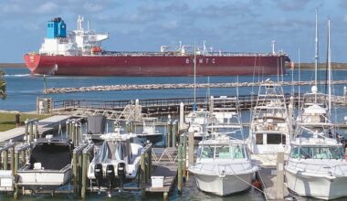 A tanker ship passes Dennis Dreyer Municipal Harbor in Port Aransas on a recent day. Folks using the boat ramps in the harbor should watch for passing ships because they can cause water levels at the ramps to fluctuate, creating safety concerns. Staff photo by Dan Parker