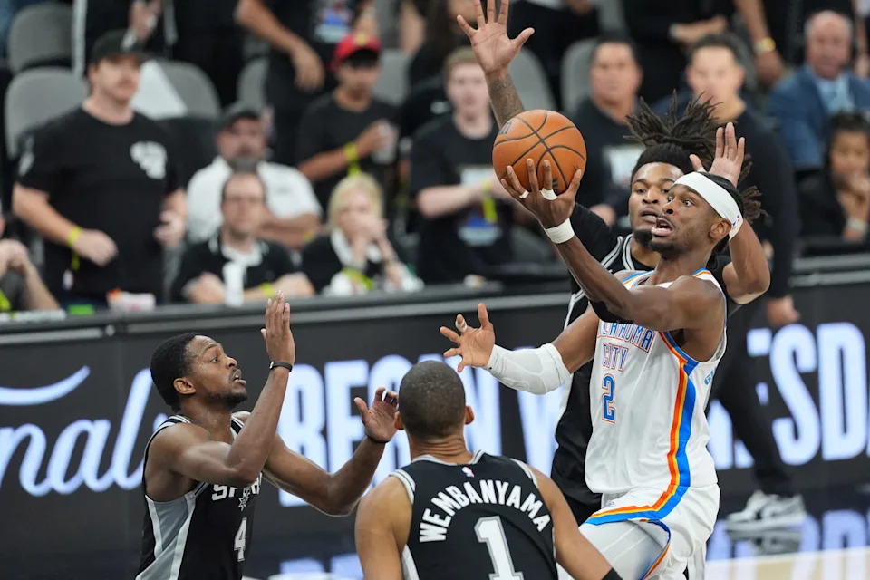 May 28, 2026; San Antonio, Texas, USA; Oklahoma City Thunder guard Shai Gilgeous-Alexander (2) shoots the ball against the San Antonio Spurs in the first half during game six of the western conference finals for the 2026 NBA playoffs at Frost Bank Center. Mandatory Credit: Dustin Safranek-Imagn Images