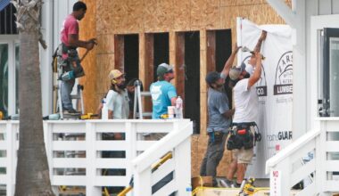 Workers toil at expanding Cita Coastal Resort Wear and Home Goods on a recent day. The project is expected to be finished by early June. Staff photo by Dan Parker