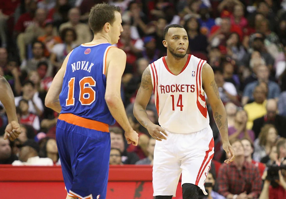 November 23, 2012; Houston, TX, USA; Houston Rockets shooting guard Daequan Cook (14) runs down the court during the second quarter against the New York Knicks at Toyota Center. Mandatory Credit: Troy Taormina-USA TODAY Sports