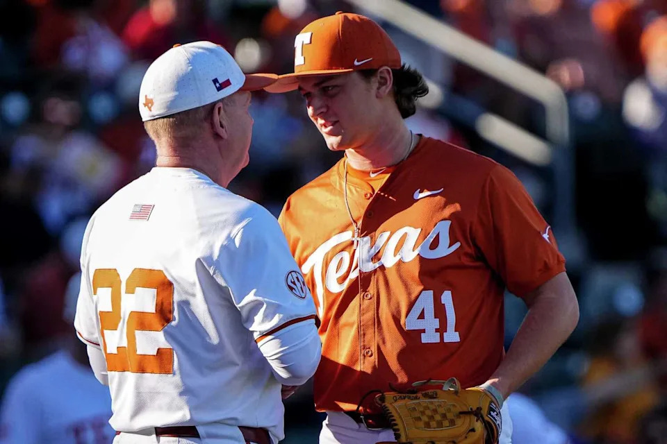 Texas Longhorns head coach Jim Schlossnagle takes out pitcher Cody Howard (41) during the annual Texas baseball alumni game at UFCU Disch-Falk Field on Saturday, Feb. 1, 2025. (Aaron E. Martinez/American-Statesman)