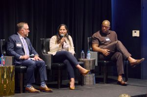 Tisha Vaidya (center) speaks during a panel with Andy Carmody (left) and Edwin D. Tatum at the Commercial Observer Development and Investor Forum in Dallas.
