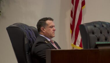 a council member sitting in a meeting