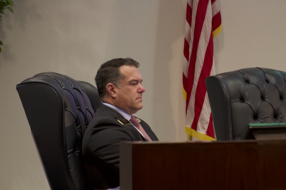 a council member sitting in a meeting