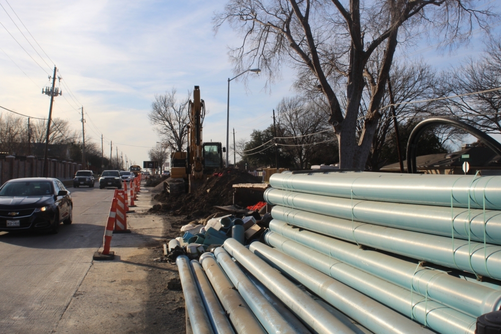 Crews are laying a pavement preservation treatment and doing small arterial concrete repairs along various roads, including along Independence Parkway and Parker Road in Plano. (Michael Crouchley/Community Impact)