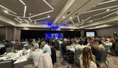 Pflugerville mayor Doug Weiss speaks at the May 7 State of City luncheon at the Courtyard by Marriott. (Grant Crawford/Community Impact)
